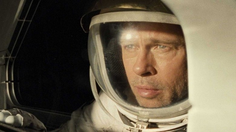Roy McBride looking thoughtful and wearing a space suit in Ad Astra