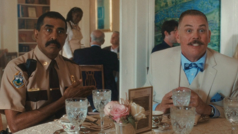 Thorny and Rod sitting at a table together in Super Troopers 3