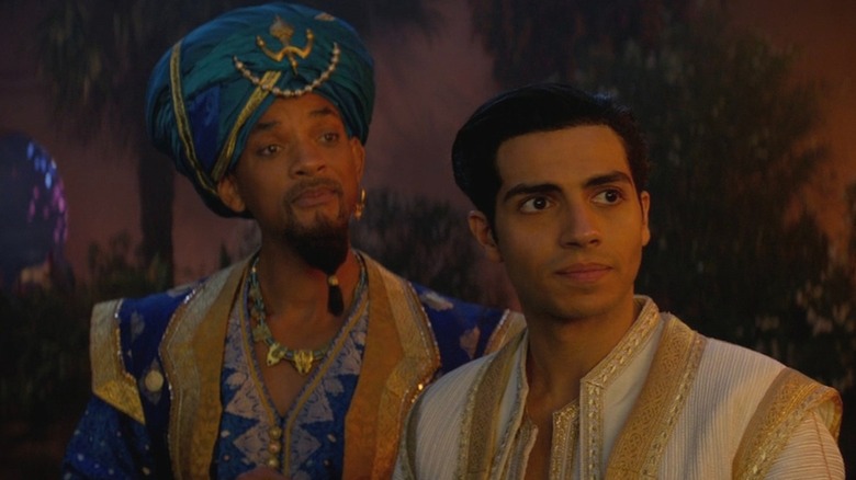 The Genie and Aladdin talking to Jafar in Aladdin