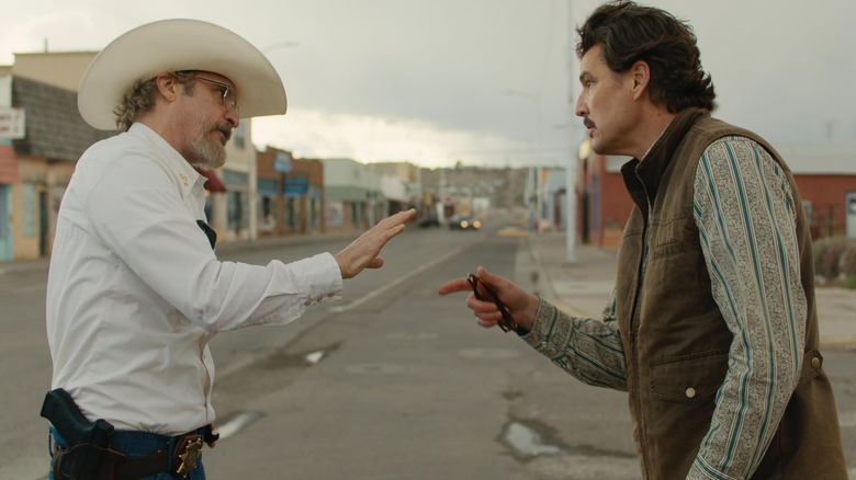 Joe Cross and Ted Garcia get into an argument in "Eddington" (2025)