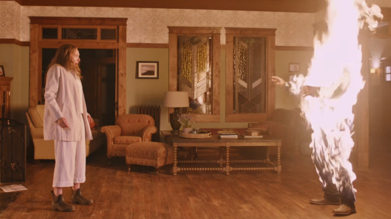 Annie watches her husband go up in flames in "Hereditary" (2018)