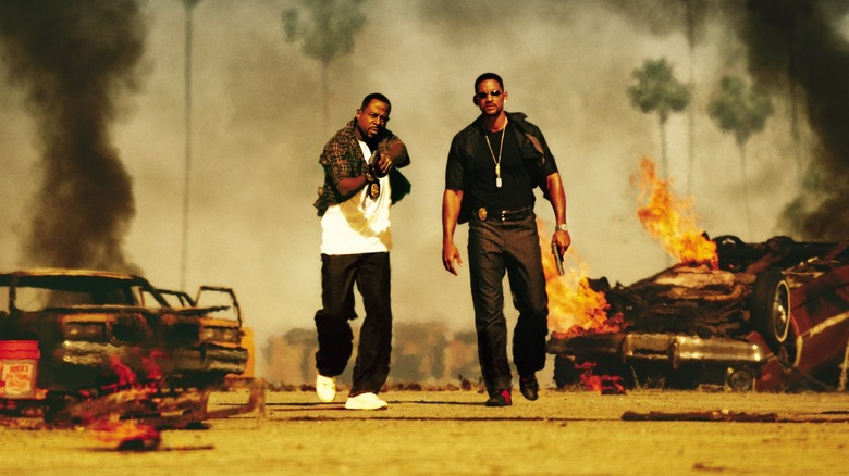 Marcus and Mike approach an explosive shootout in Bad Boys II (2003)