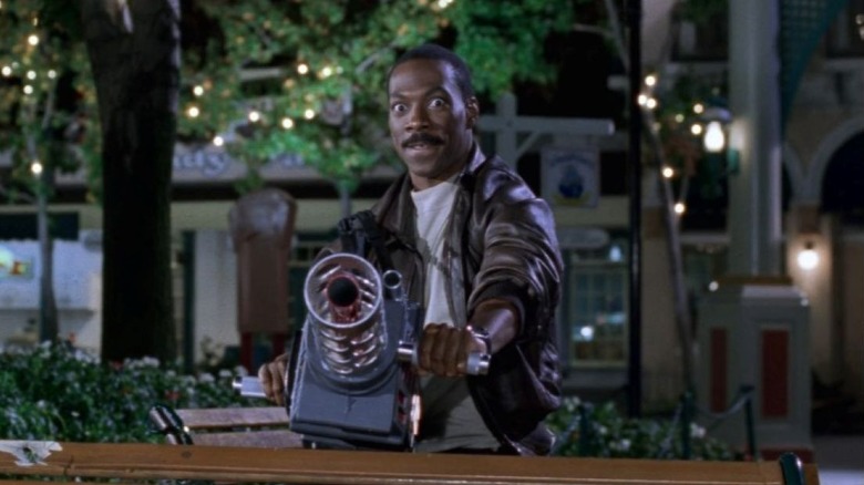Axel Foley aims the Annihilator 2000 inside Wonder World in Beverly Hills Cop III (1994)