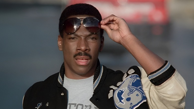 Axel Foley lifting up his shades in Beverly Hills Cop II (1987)