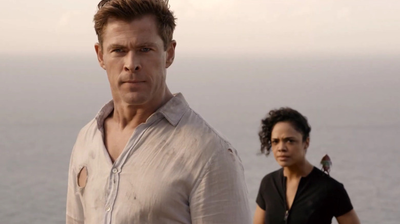 Agent H, Agent M, and Pawny by a cliff in Men in Black: International