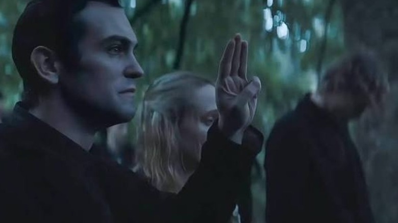 Burdock saluting Haymitch in The Hunger Games: Sunrise on the Reaping