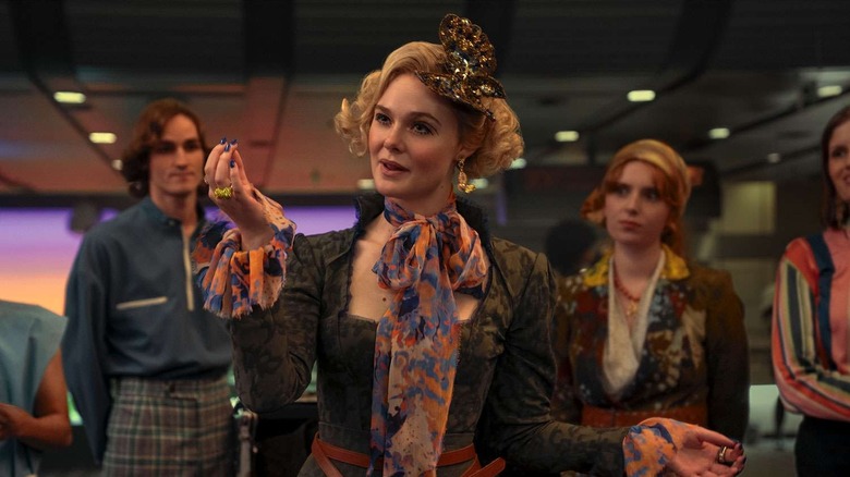 Effie with other stylists behind her