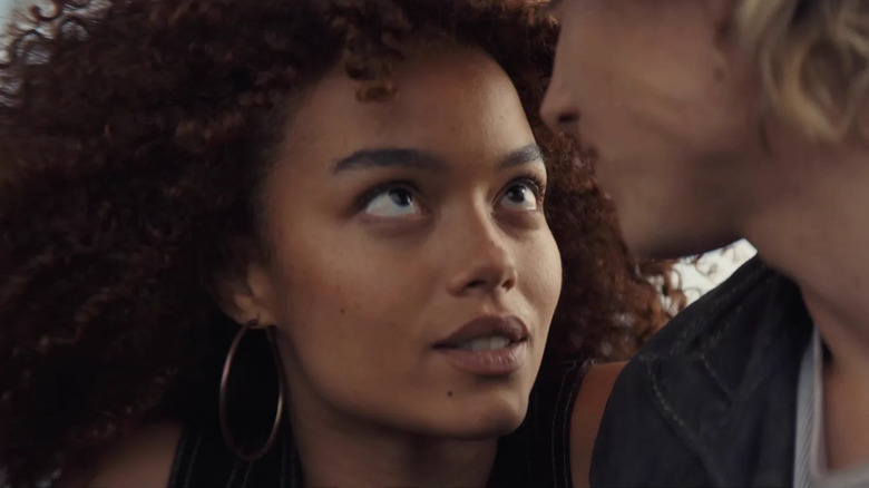 Lenore looking into Haymitch's eyes in The Hunger Games: Sunrise on the Reaping