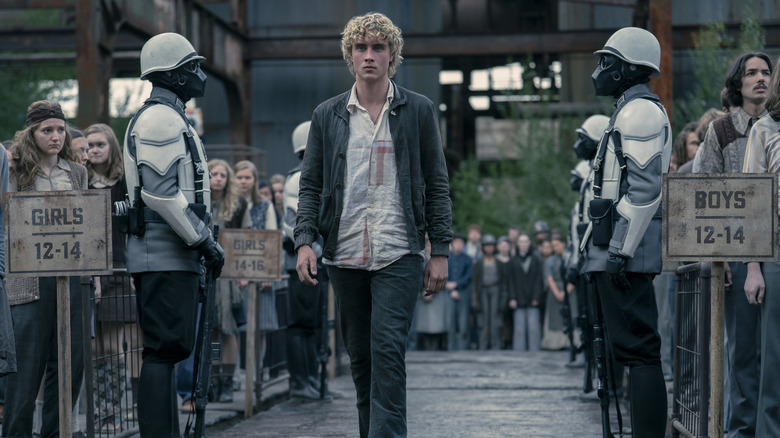 Haymitch walking to the stage in District 12 in The Hunger Games: Sunrise on the Reaping