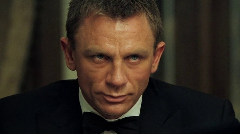James Bond looking up intensely during a poker game in "Casino Royale" (2006)