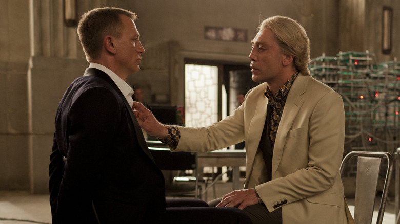 Silva toys with a tied-up James Bond in "Skyfall" (2012)