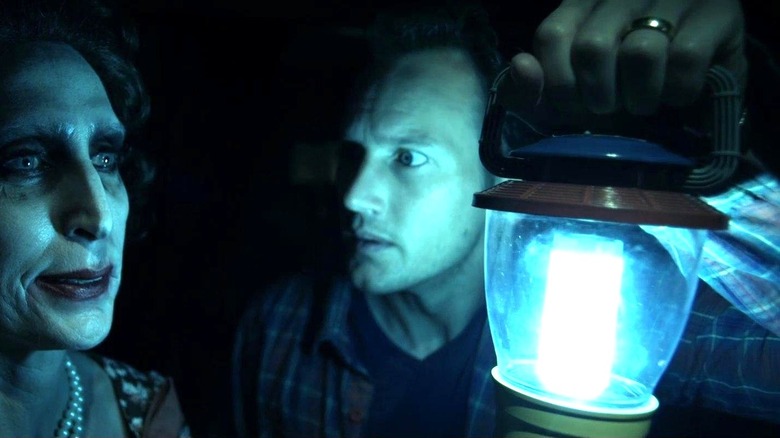 Josh Lambert looking at a ghost in Insidious