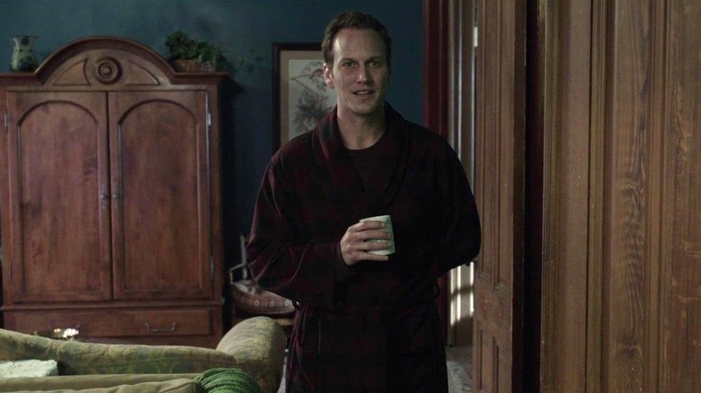 Josh Lambert holding a cup in Insidious: Chapter 2