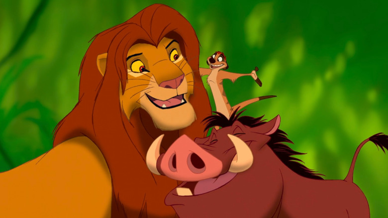Adult Simba, Timon and Pumbaa singing together in The Lion King