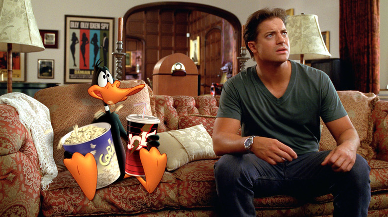 Daffy and D.J watch the news in Looney Tunes: Back in Action (2003)