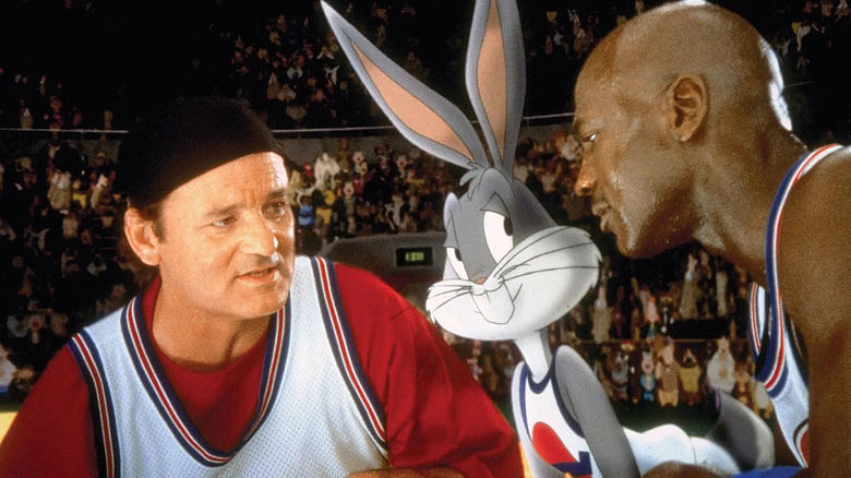 Bill Murray, Bugs Bunny, and Michael Jordan huddled up in Space Jam (1996)