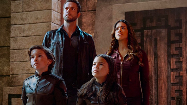 The main family of Spy Kids: Armageddon (2023) viewing something ahead