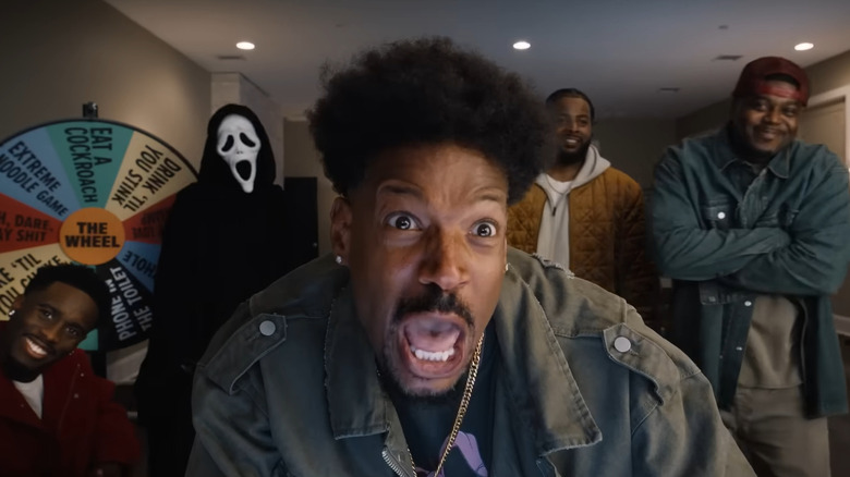 Shorty hanging out with Ghostface and some streamers in "Scary Movie" (2026)