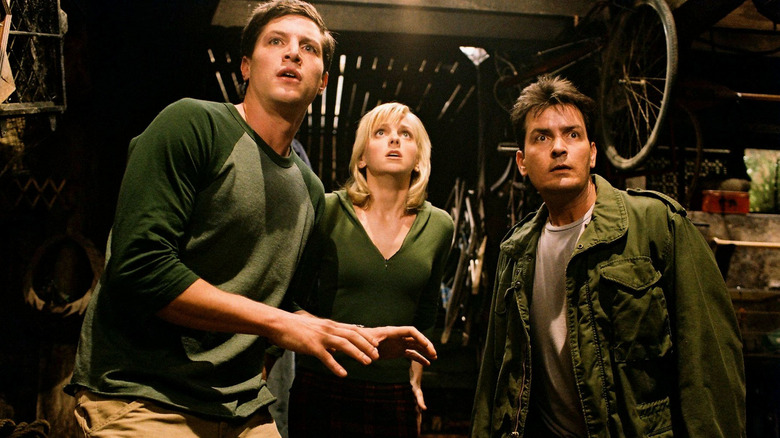 George, Cindy, and Tom look frightened in "Scary Movie 3" (2003)