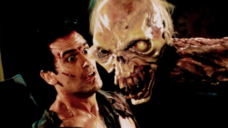 Ash encountering a deadite in Evil Dead II (1987)