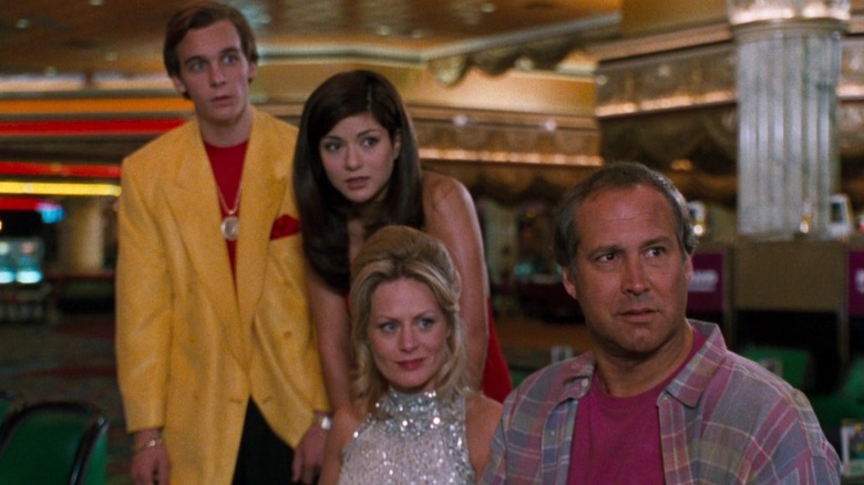 The Griswolds looking at someone in a casino in Vegas Vacation