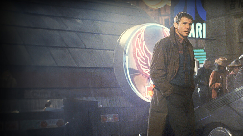 Deckard in dystopian Los Angeles in Blade Runner (1982)