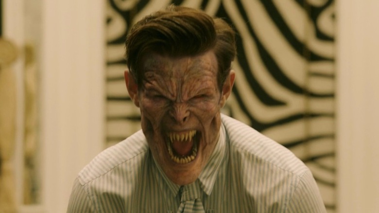 Milo Morbius flexing his Lucien form in a mirror in Morbius
