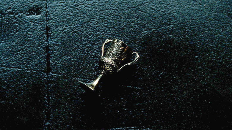 Helga Hufflepuff's cup laying on the ground in Harry Potter and the Deathly Hallows Part 1