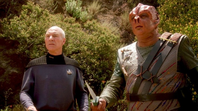 Jean-Luc Picard and Dathan looking serious on Star Trek: The Next Generation