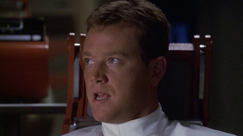 Tom Paris piloting a shuttlecraft on Star Trek: Voyager