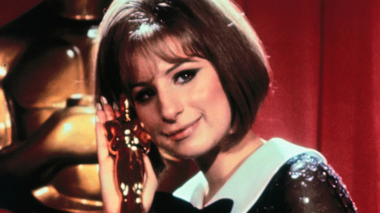 Barbra Streisand holds her Oscar in 1968