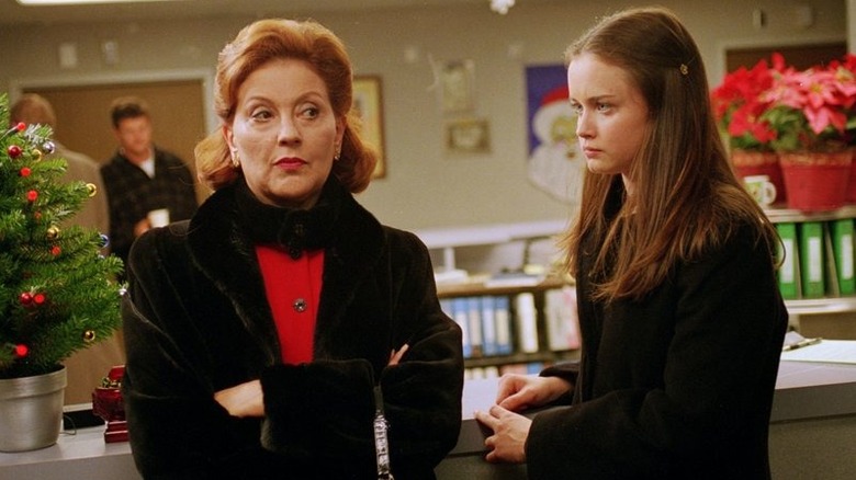 Emily looking angry and Rory looking confused at a nurse's station