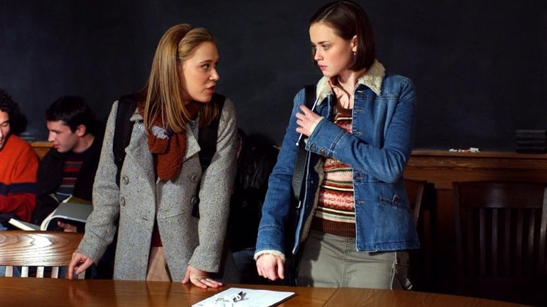 Paris talking intensely to Rory in the Yale Daily News office on Gilmore Girls