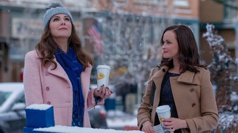 Lorelai and Rory in the town square looking up at the sky on Gilmore Girls: A Year in the Life