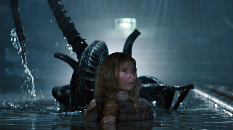 A Xenomorph hunting Newt in Aliens (1986)