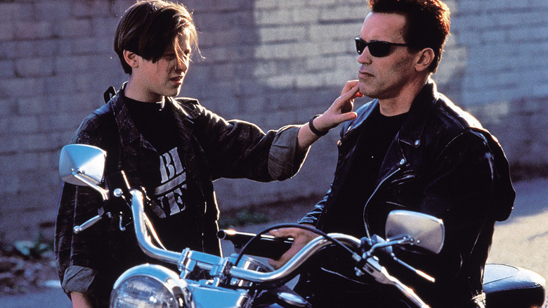 John Connor poking his robotic guardian in Terminator 2: Judgment Day (1991)