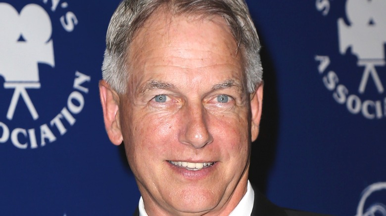 Mark Harmon smiling at event