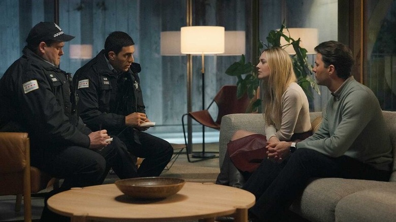 Police interviewing Jenny and Richie in their home on All Her Fault