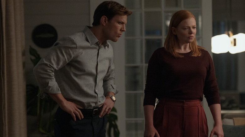 Peter with his hands on his hips and Marissa looking confused in All Her Fault