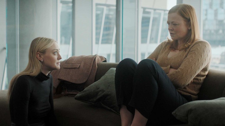 Jenny sitting on the ground talking to Marissa on the couch in All Her Fault