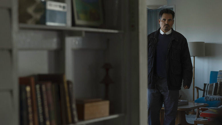 Jim looking around a corner in an apartment on All Her Fault