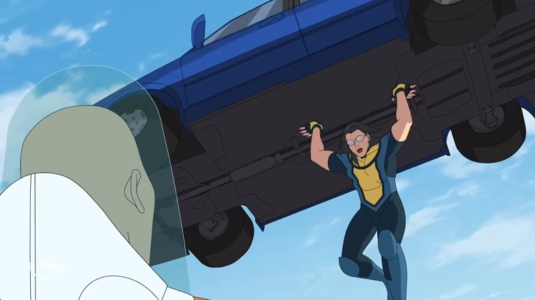 Long-Haired Invincible holding a car over his head in Invincible Season 3
