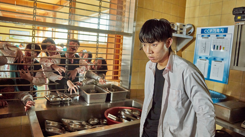 Yoon Gwi-nam takes shelter from zombies