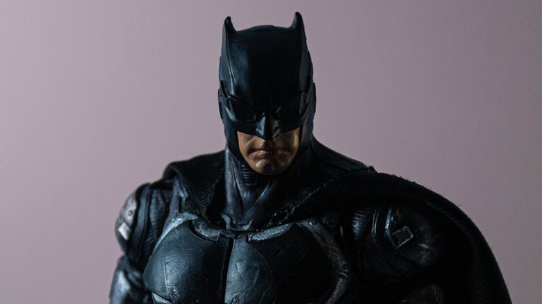 Batman against mauve background