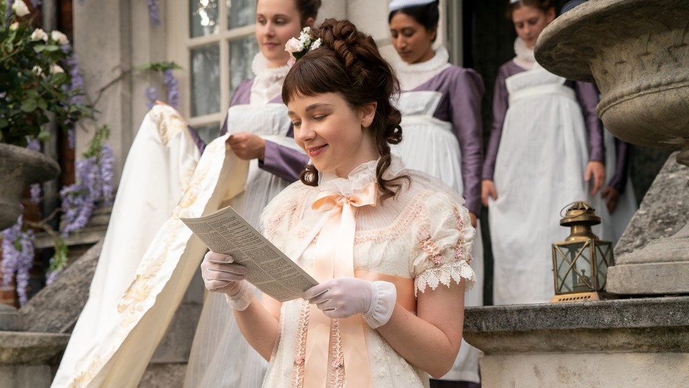 Eloise reading Lady Whistledown's column