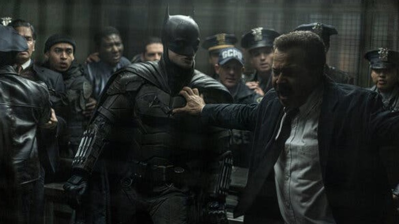 Batman and Jim Gordon fight
