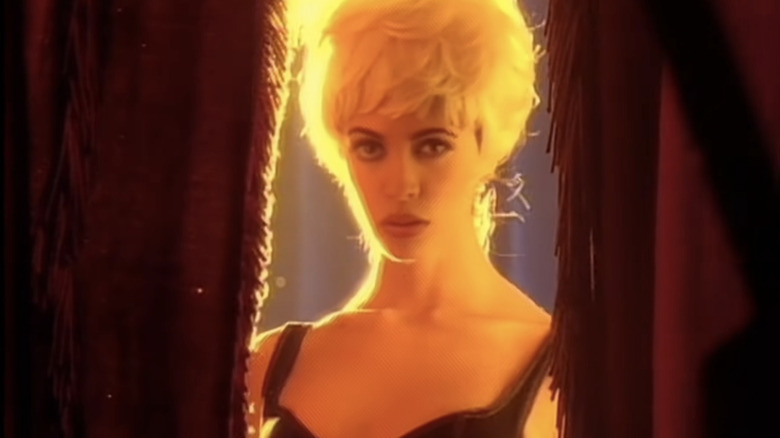 Lisa Barbuscia behind a curtain