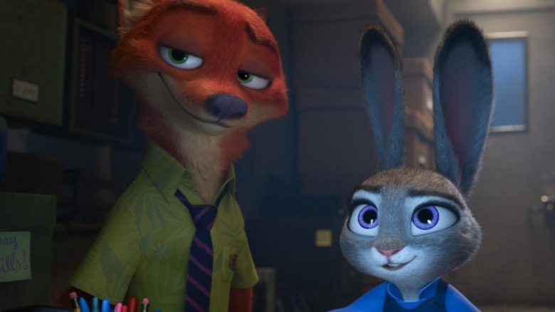 Judy and Nick smiling in an office together