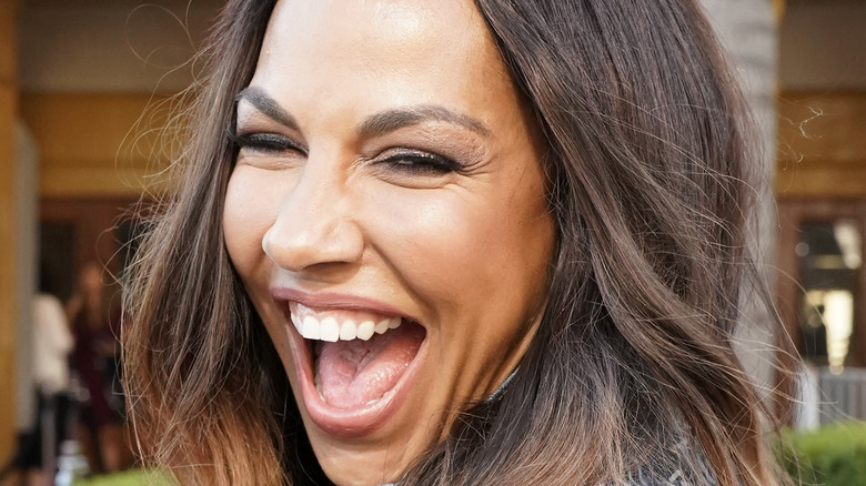 Close up of Amanda Brugel laughing