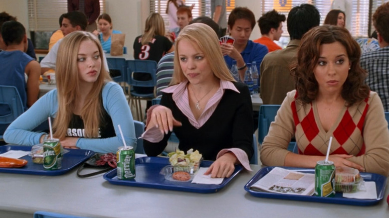 Karen, Regina, and Gretchen sitting at a table at lunch in Mean Girls
